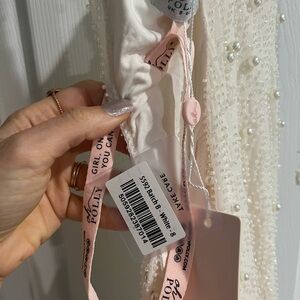 Oh Polly St Tropez white cut out dress.